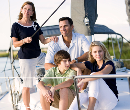 family on sail boat